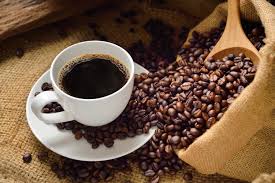 Cup of coffee with coffee beans - Coffee facts